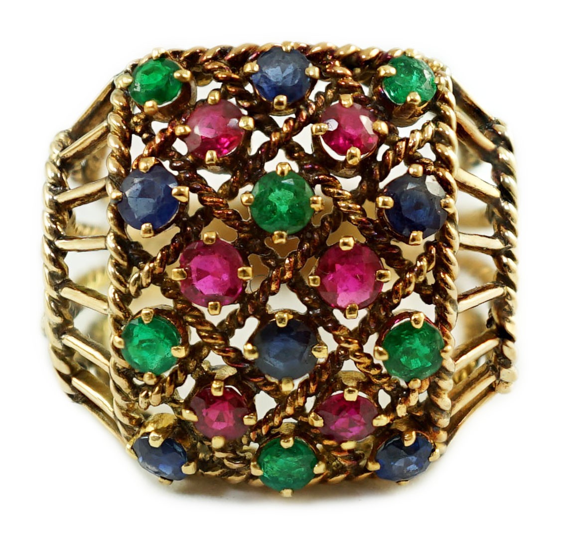 An Indian gold, ruby, sapphire and emerald cluster set dress ring
